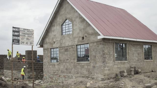 One of the first houses at Kamulu: a stone-built home with a red pitched roof.